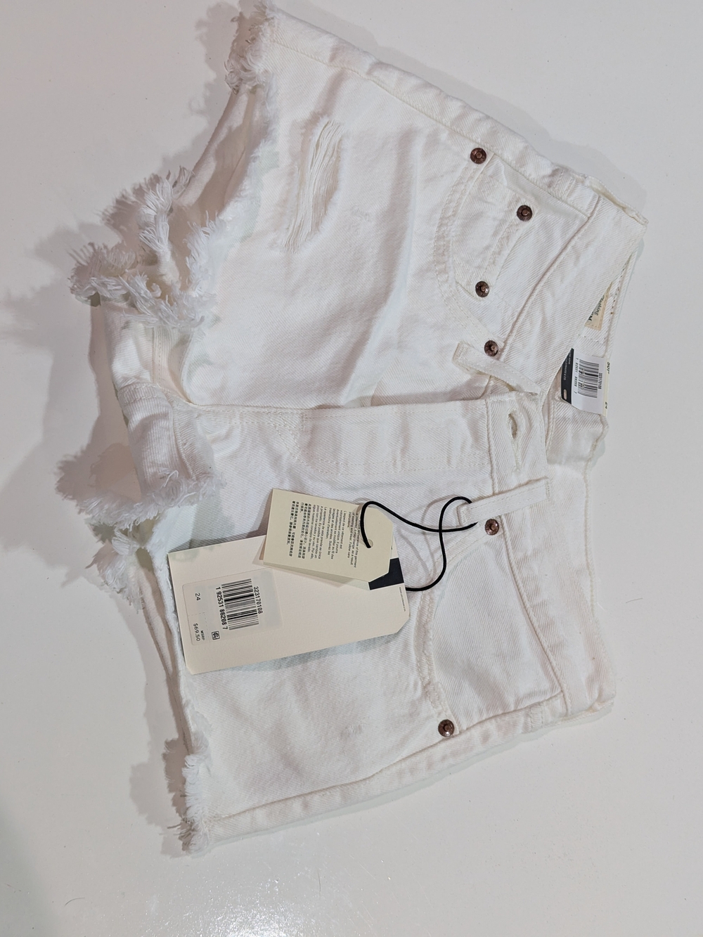 Levi's White Distressed Denim Shorts